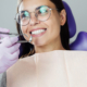 woman-is-preparing-for-dental-examination-woman-having-teeth-examined-at-dentists